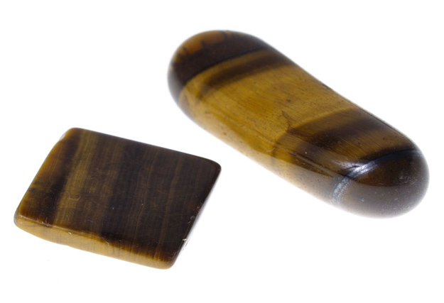 Buddha balancing on the water with the 7 Chakra colors.